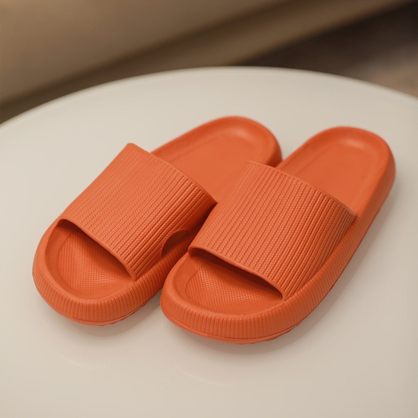 https://cdn.shopify.com/s/files/1/0666/3333/5082/products/9_Photoshoot_Cloud-Slides_Orange_thecloudslides_com_without_logo-min.jpg?v=1759417122